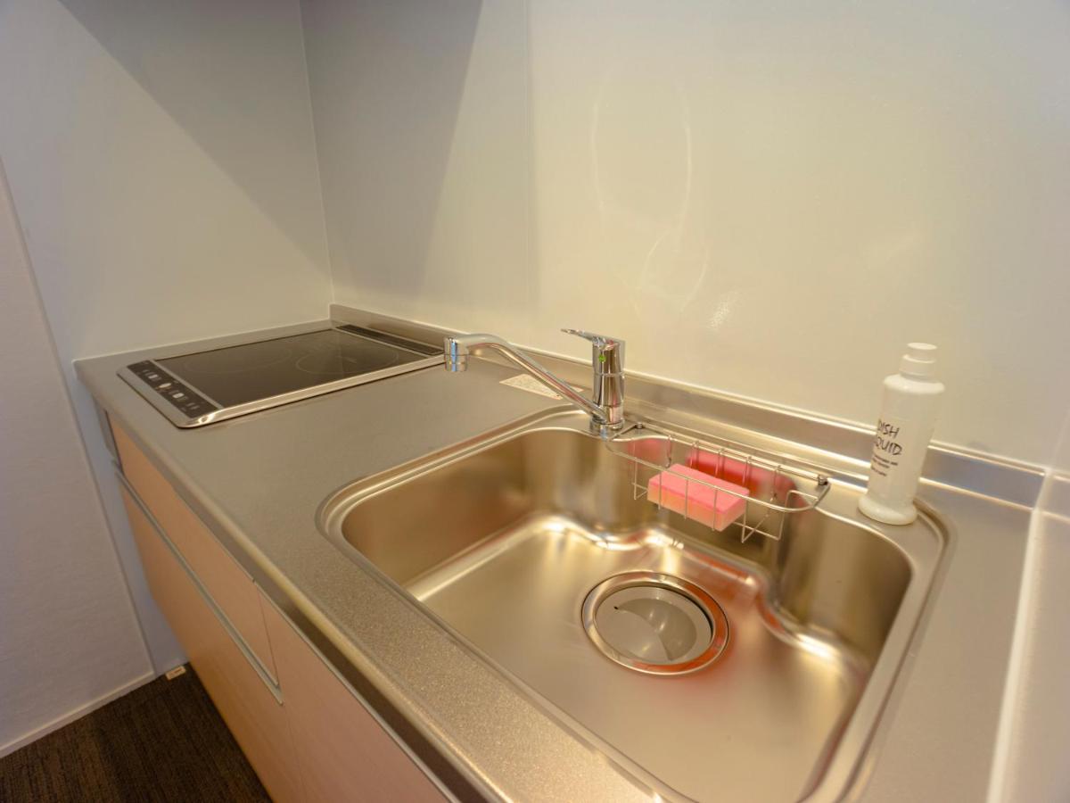 Grand Base Sumiyoshi Appartement Fukuoka  Buitenkant foto