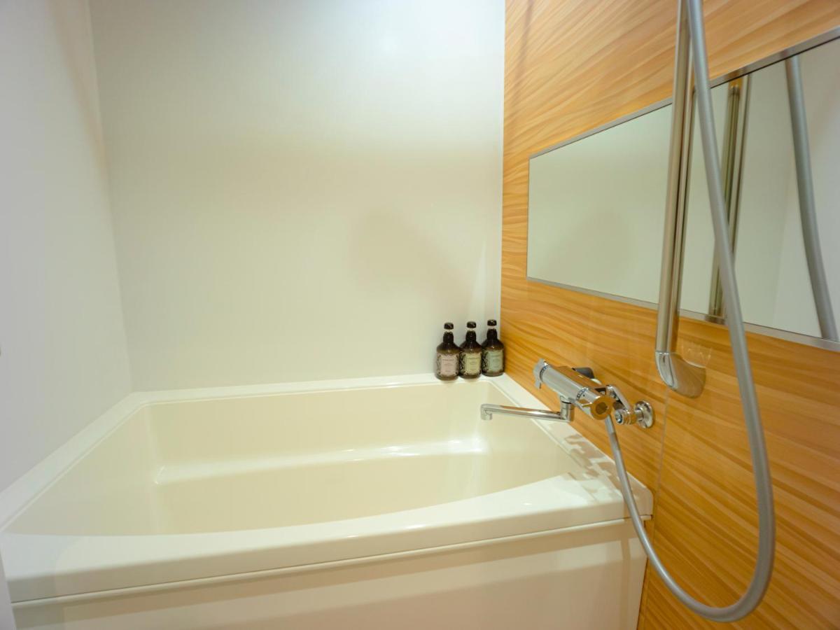 Grand Base Sumiyoshi Appartement Fukuoka  Buitenkant foto
